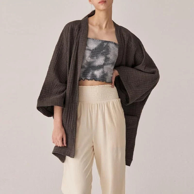 Premium 100% cotton cardigan with elegant open-stitch design, ideal for versatile everyday wear in the UK