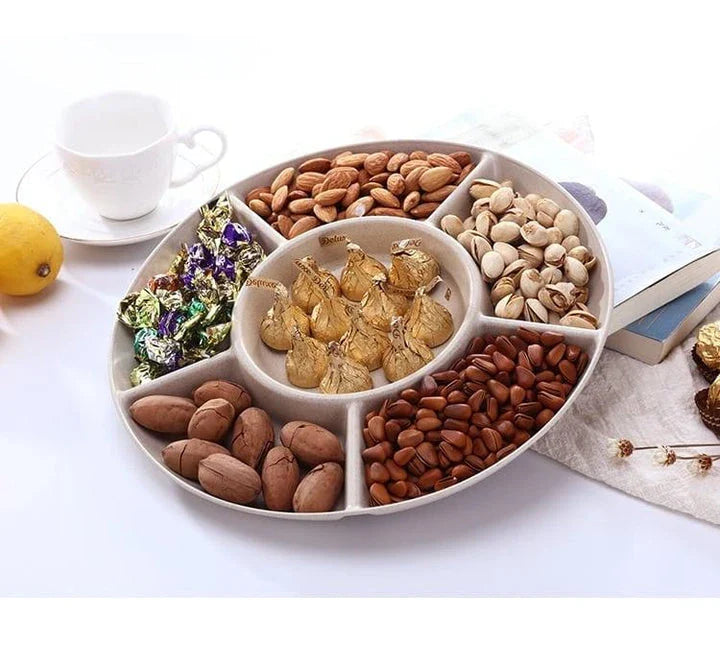 Stylish round snack plate in green and khaki colours, perfect for serving fruit, nuts, or hors d'oeuvres at UK dinner parties and tea times.