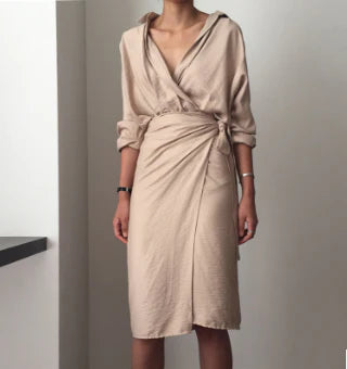 Irregular wrap dress in beige with a unique, contemporary design and premium cotton blend fabric