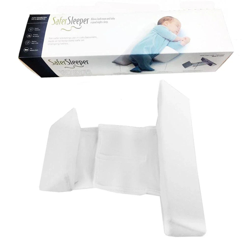 Soft, breathable cotton newborn baby sleeping pillow with adjustable fit and triangular anti-roll design for a comfortable, secure sleeping experience