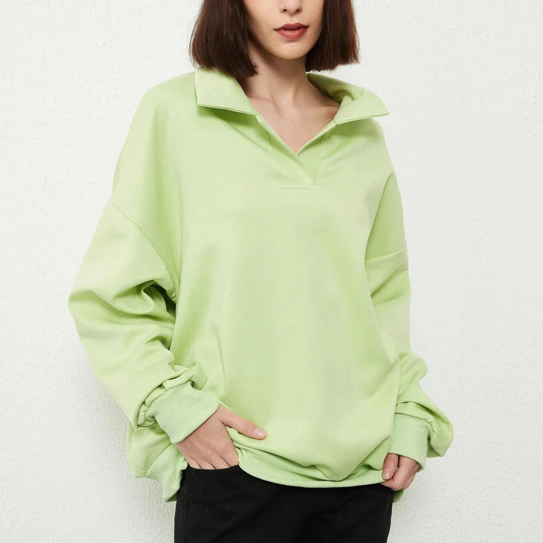 A stylish and comfortable oversize solid pullover with a turn-down collar, perfect for casual wear in the UK.