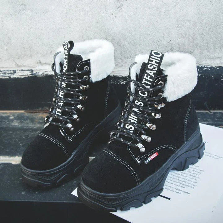 Stylish British platform boots with faux suede upper, lace-up closure, and wedge heel design