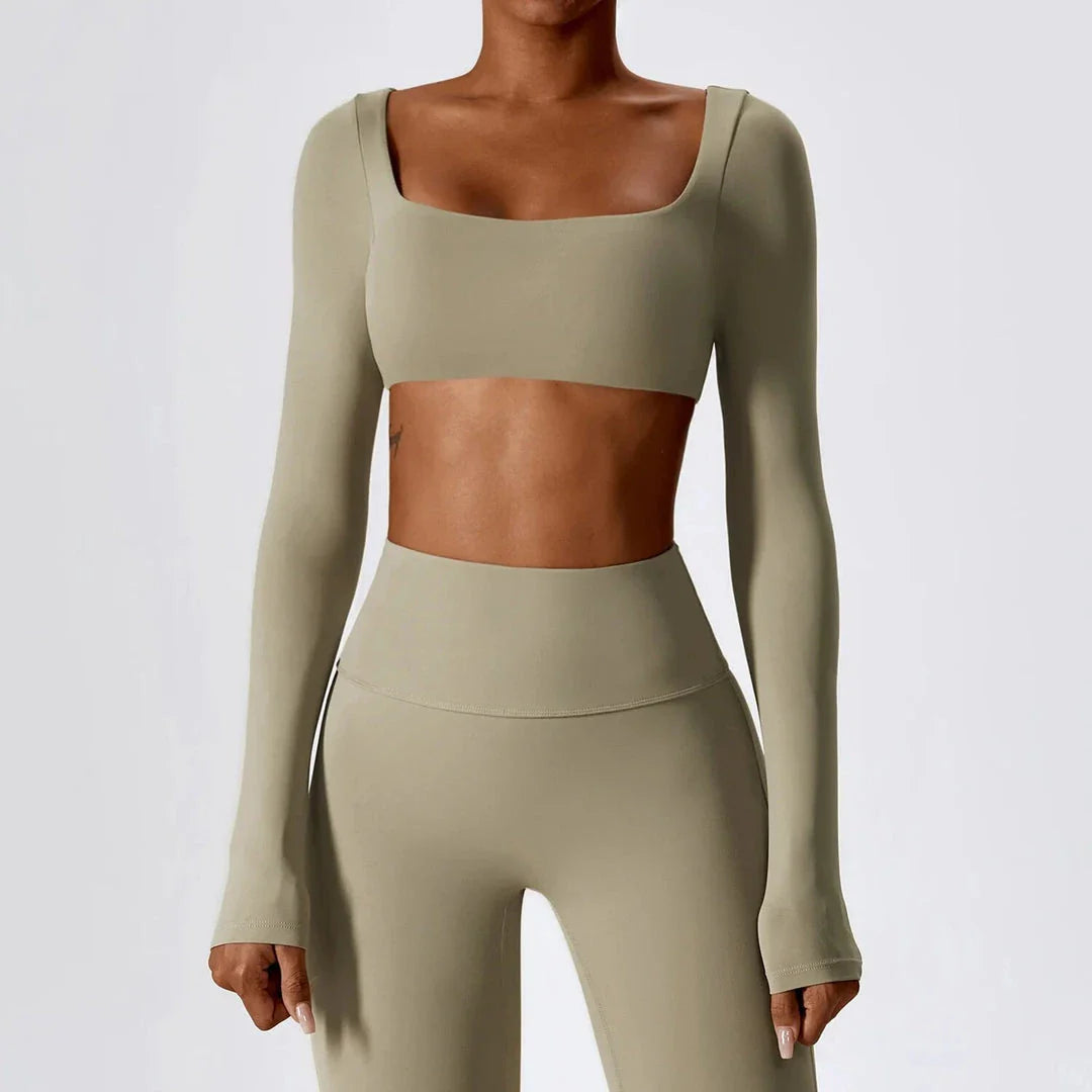 Stylish long sleeve crop top yoga shirt in green, designed for comfort and performance during workouts