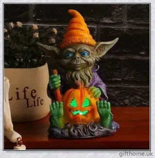 Eerie Halloween Resin Figurine with Glowing Pumpkin Lamp, a spooky and enchanting décor piece for your holiday celebrations