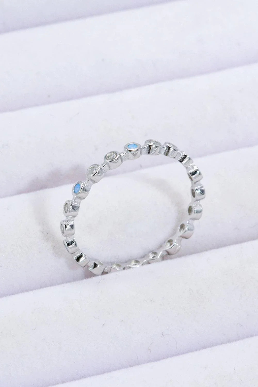 Elegant 925 sterling silver ring with natural moonstone centrepiece and zircon accents