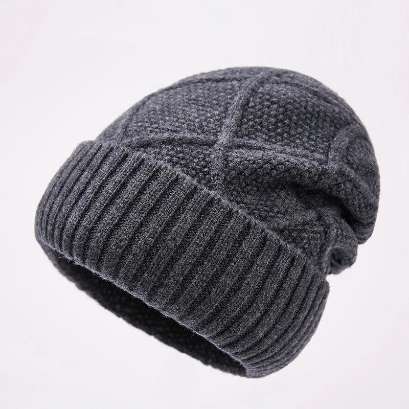 Premium knitted hat in various colours with a dome-shaped design, concave stripe pattern, and adjustable fit for warm outdoor fashion