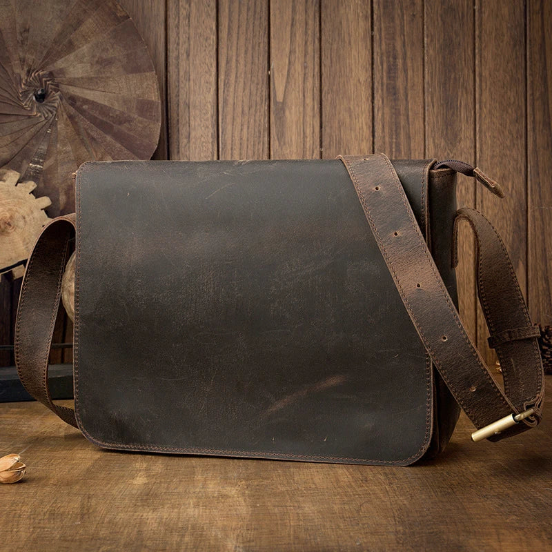 A retro-inspired leather shoulder bag for men, featuring a classic British design and high-quality construction