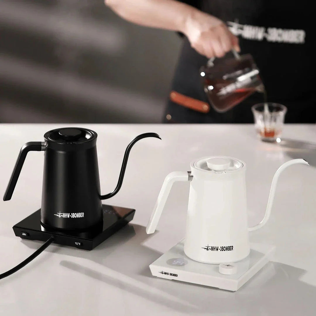 A stainless steel electric gooseneck kettle with precise temperature control and an elegant design, perfect for hand-brewing coffee at home.