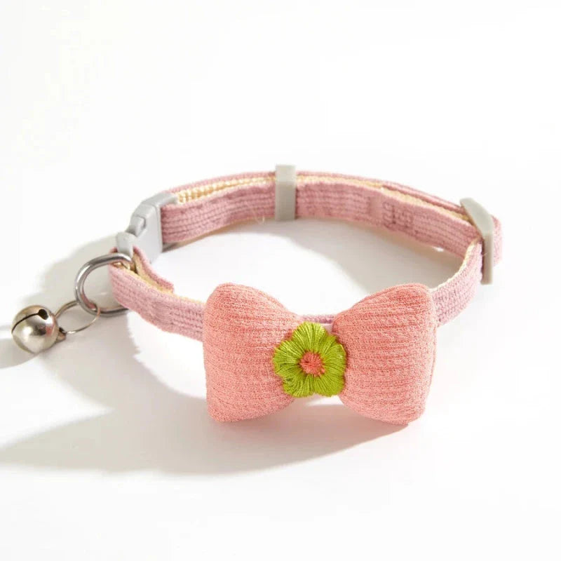 Stylish checkered pet collar with elegant butterfly knot decoration, perfect for dressing up cats and dogs