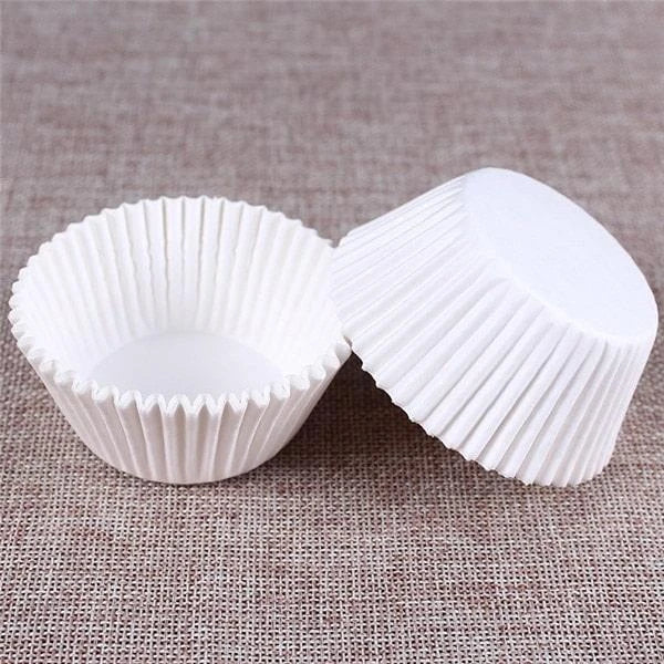 Premium British-made paper cupcake liners in a mixed colour pack, perfect for baking delicious treats at home
