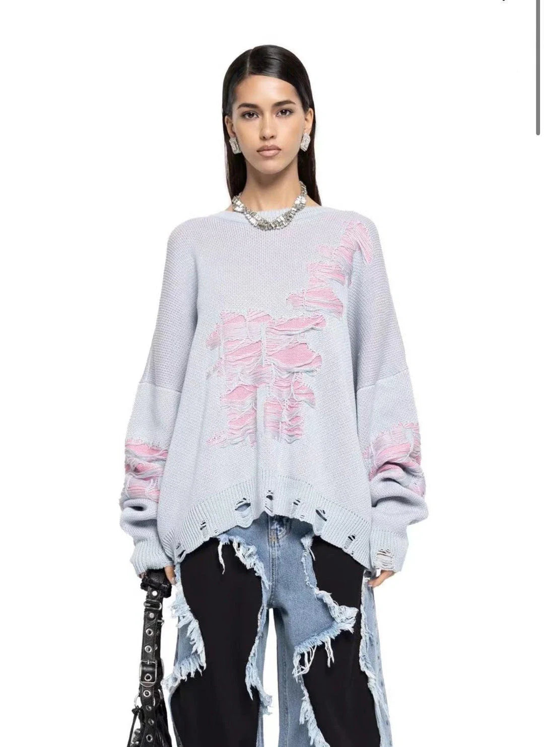 A stylish ripped long sleeve top in a variety of versatile colours, including grey, green, and black.