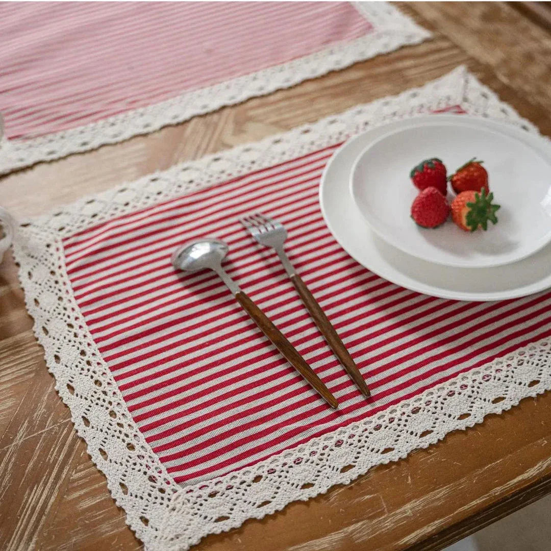 Elegant geometric lace placemats in red and blue stripes, designed to protect and decorate your dining table