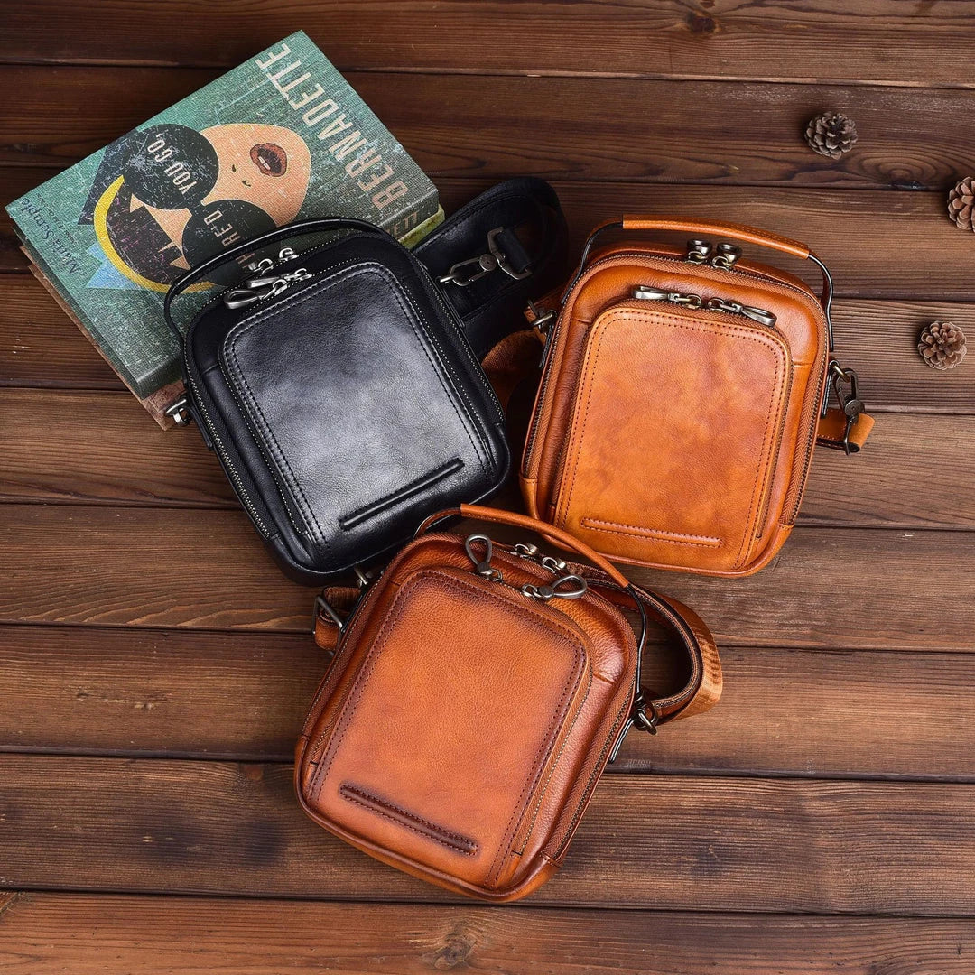 Premium retro leather messenger bag with spacious main compartment, side pockets, and robust handle for comfortable carrying