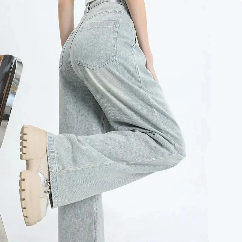 Premium high-waisted vintage straight leg women's jeans in a light wash finish with decorative details