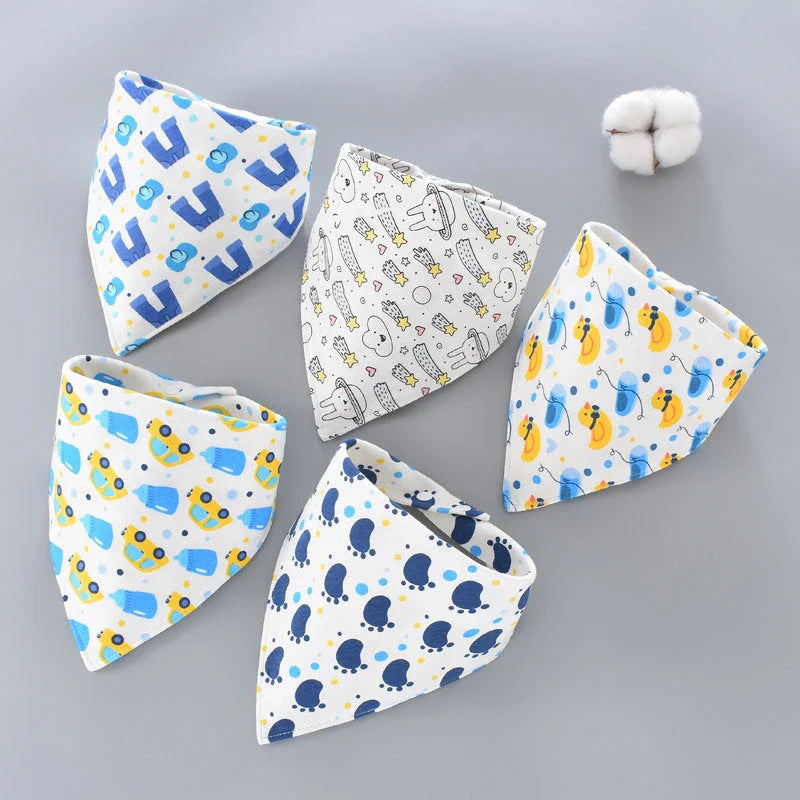 Stylish cotton baby bandana bibs in various fashionable prints, designed to keep your little one dry and comfortable.
