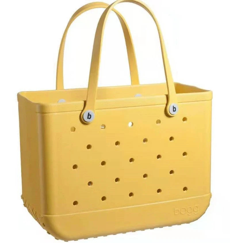 Premium waterproof beach tote bag in various vibrant colours, featuring spacious main compartment and multiple pockets for organised storage