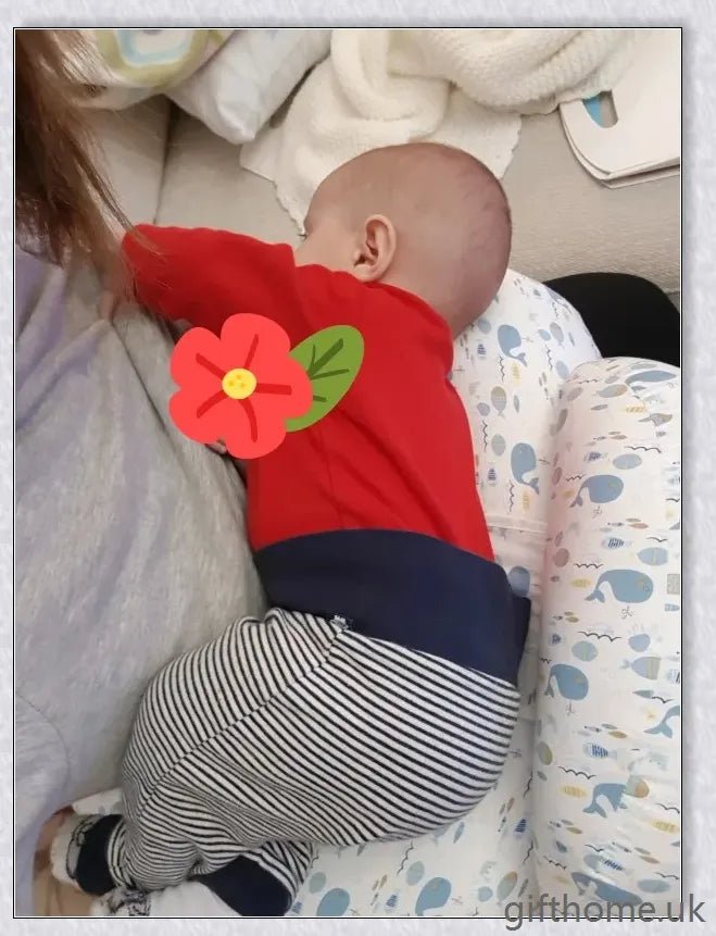 Premium breastfeeding nursing pillow with adjustable buckle, soft cotton fabric, and extra cushioning to support baby's head and prevent reflux.