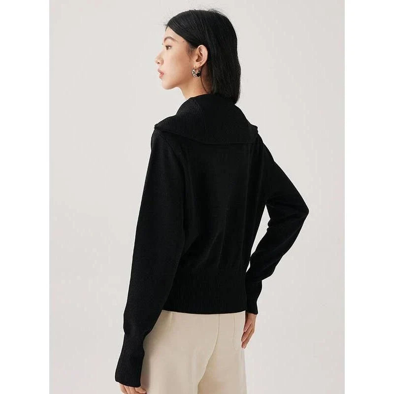 Elegant black silk-cotton blend cardigan with zipper closure, featuring a refined A-straight design and stylish details