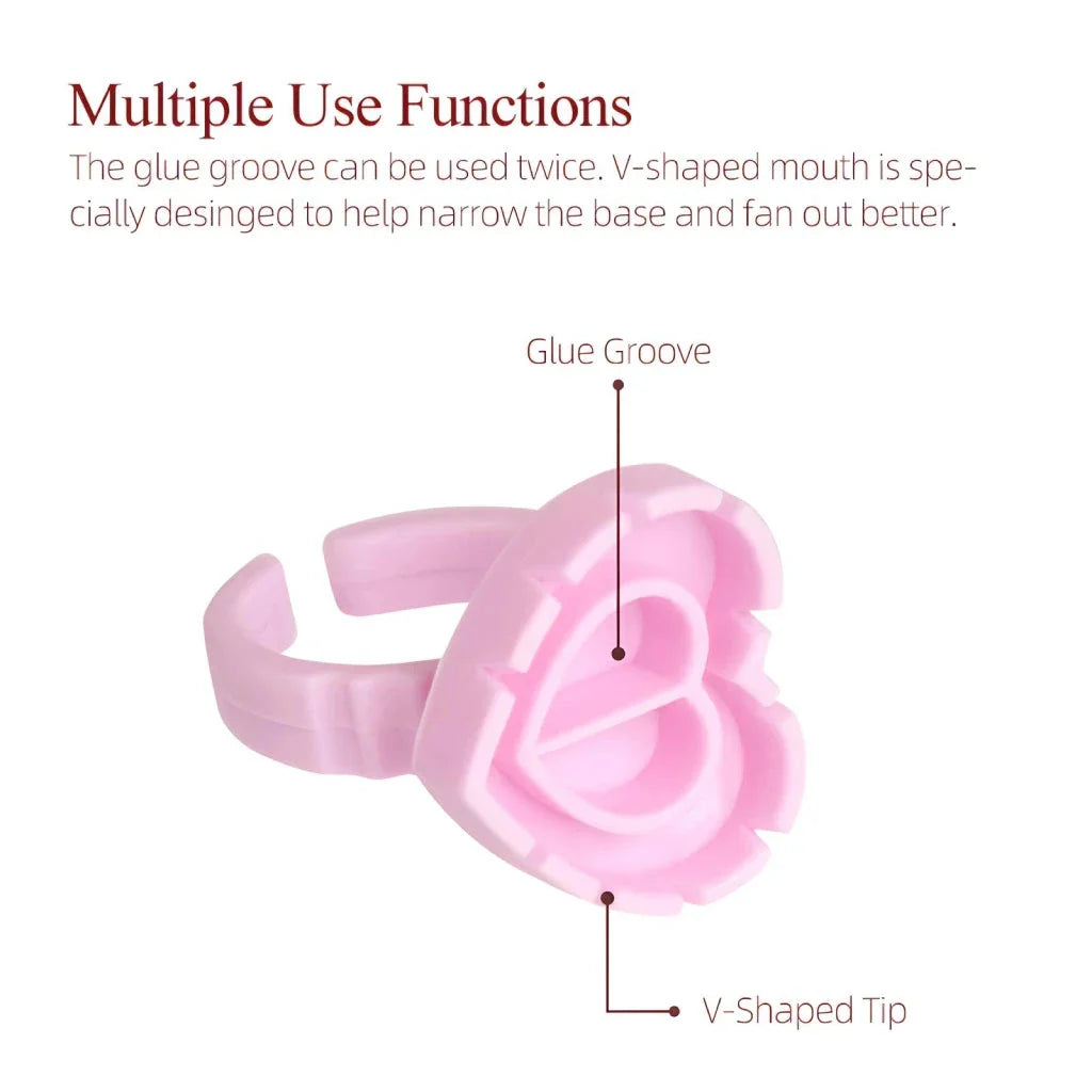 Heart-shaped disposable eyelash glue rings in blue, pink, and white colours