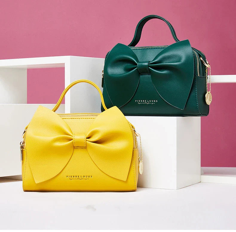 Elegant brown Korean-inspired bow shoulder bag with adjustable strap and roomy interior