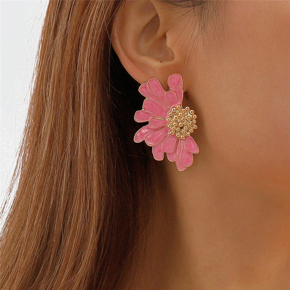 Vibrant, multi-coloured floral petal stud earrings with a blend of bohemian and modern influences