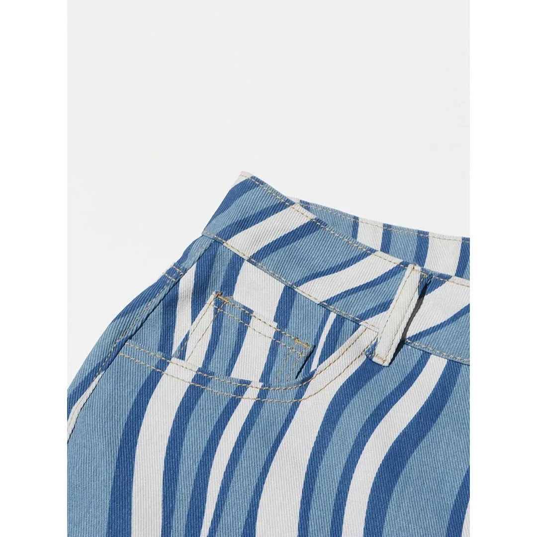 Women's high-waist striped denim trousers in a stylish blue colour, featuring a unique pattern and functional design for everyday wear.