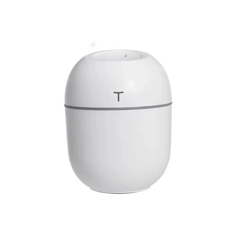 Compact ultrasonic humidifier and aroma diffuser with LED night lamp, available in white colour