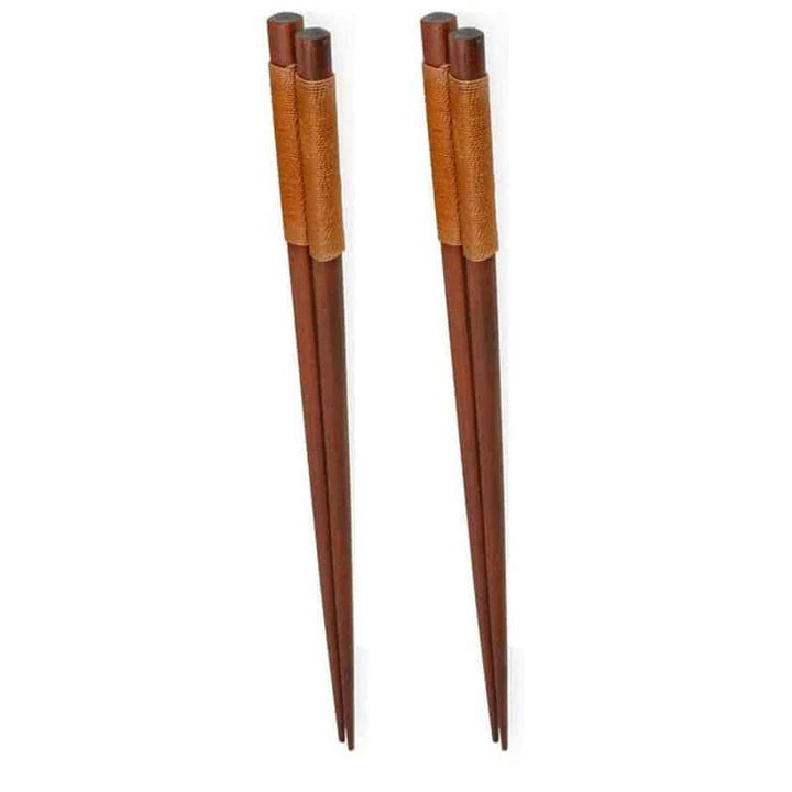 A set of four high-quality wooden chopsticks in a sleek, Japanese-inspired design