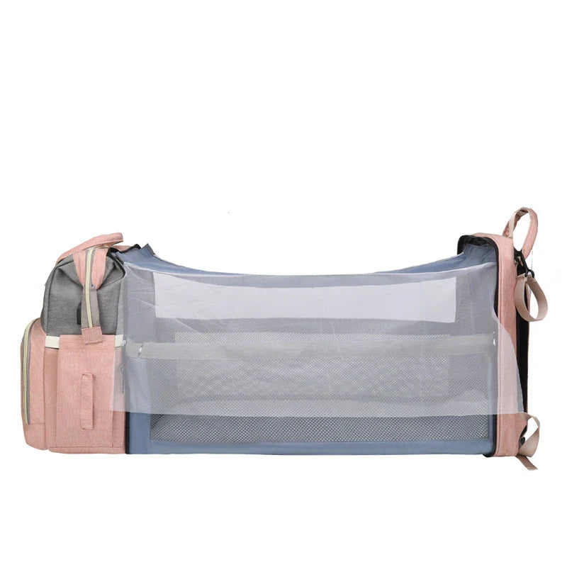 Multifunctional maternity diaper backpack with removable mosquito net, foldable crib, and water-resistant design for convenient family travel
