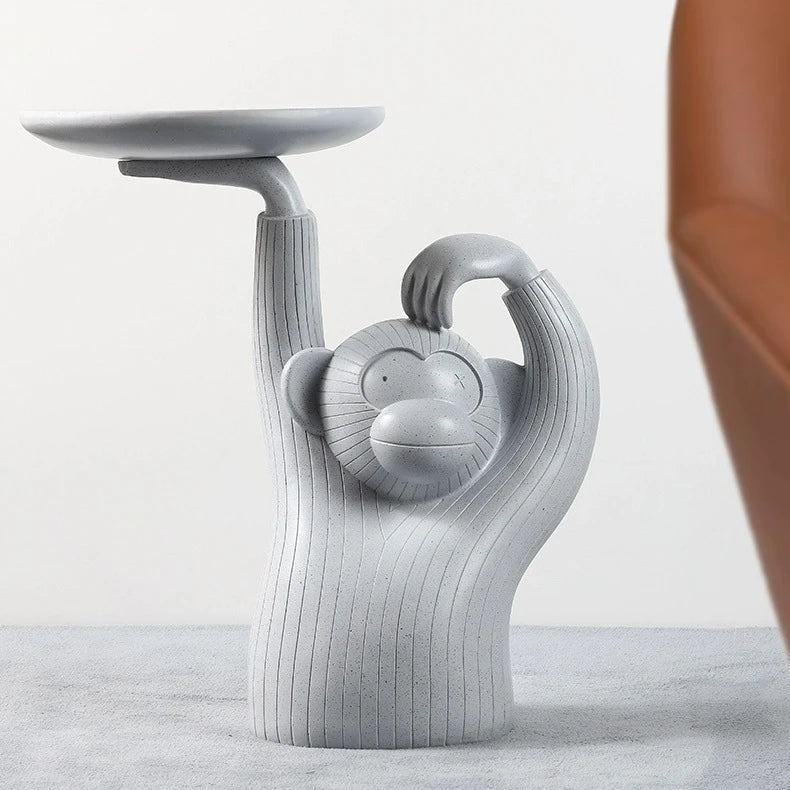 Decorative monkey-inspired resin coffee table tray in light grey or dark grey colour, suitable for serving, display, or as a living room accent piece.