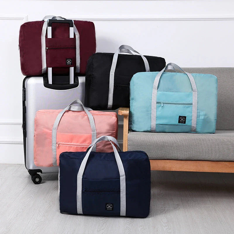 Premium foldable travel duffel bag in a solid colour design, with a large capacity and lightweight construction for women's travel needs.