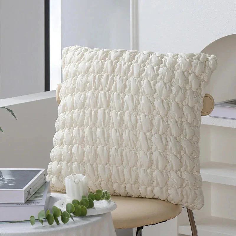 Luxurious cream and green jacquard cushion cover with a unique pattern, measuring 45 x 45 cm for a generous size and impactful presence.