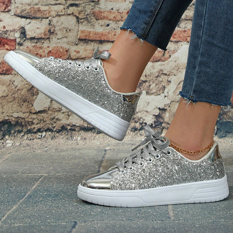 Glittering sequin flats with thick soles and lace-up closure in various vibrant colours