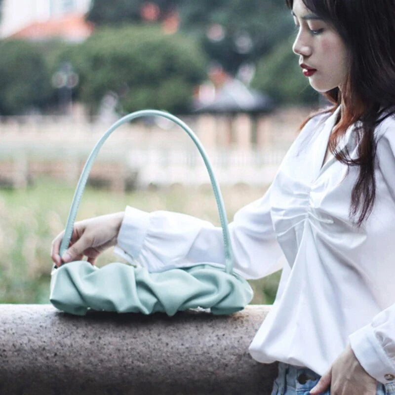 Pleated fashion one-shoulder diagonal handbag in various colours including white, yellow, green, black, and light blue