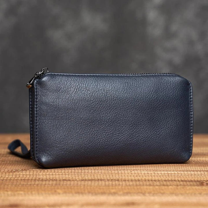 Premium genuine leather handbag in a sleek, contemporary design with secure zipper closure and internal organisation pockets