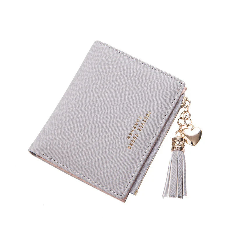 Premium genuine leather women's coin purse with zipper closure, available in black, brown, and navy colours, and multiple sizes.