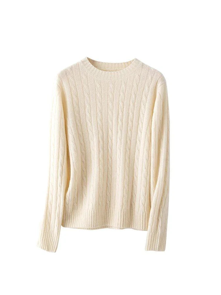 A luxurious 100% British wool cable knit jumper in a rich camel colour, perfect for keeping warm during the UK's chilly winters.