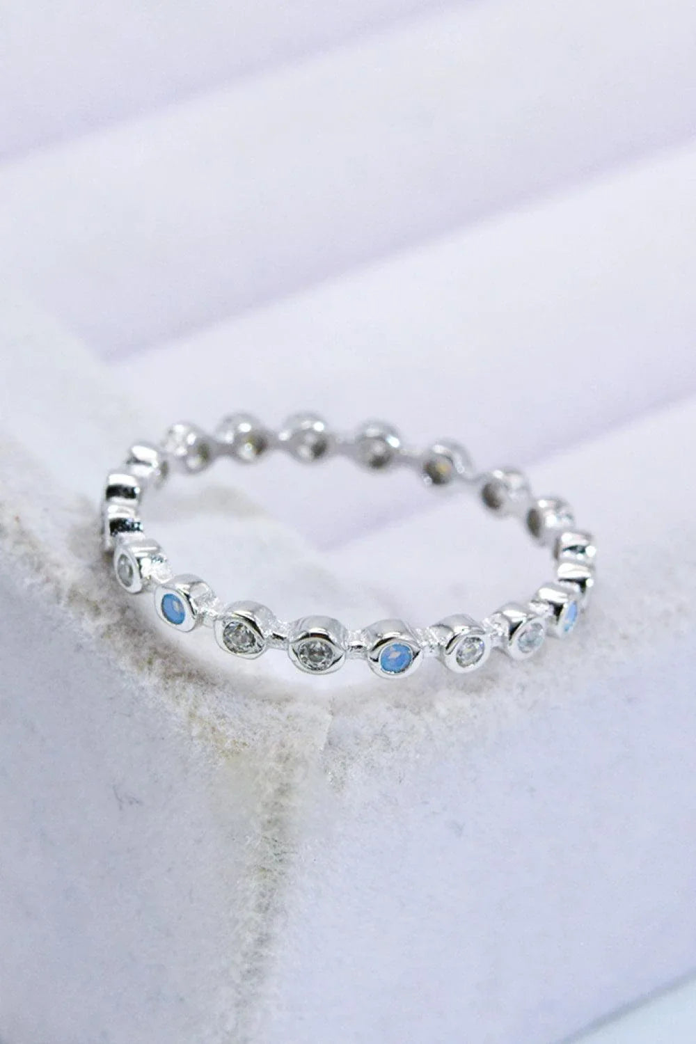 Elegant 925 sterling silver ring with natural moonstone centrepiece and zircon accents