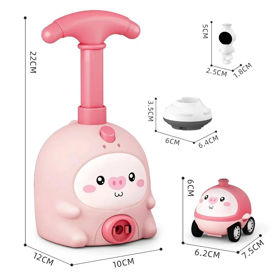 Balloon-powered launcher and car set for children, featuring a pink pig design and components for educational science play