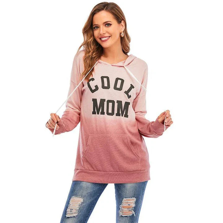 Women's tie-dye hooded sweater with kangaroo pocket in various colours, perfect for casual wear in the UK