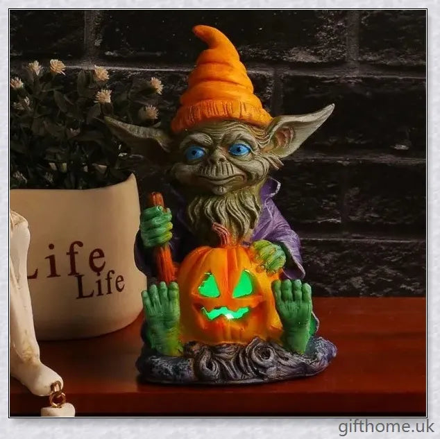 Eerie Halloween Resin Figurine with Glowing Pumpkin Lamp, a spooky and enchanting décor piece for your holiday celebrations