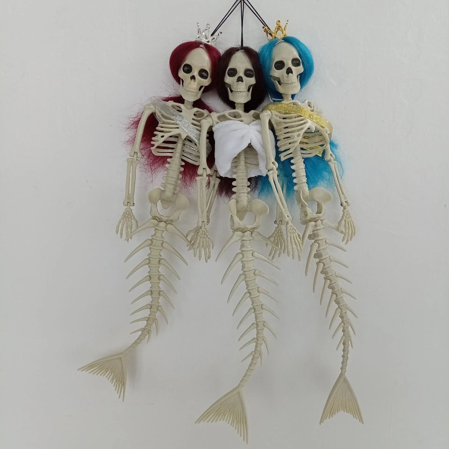 Mermaid bone pendant decoration in brown, dark purple, burgundy, and lake blue colours, ideal for Halloween outdoor courtyard displays