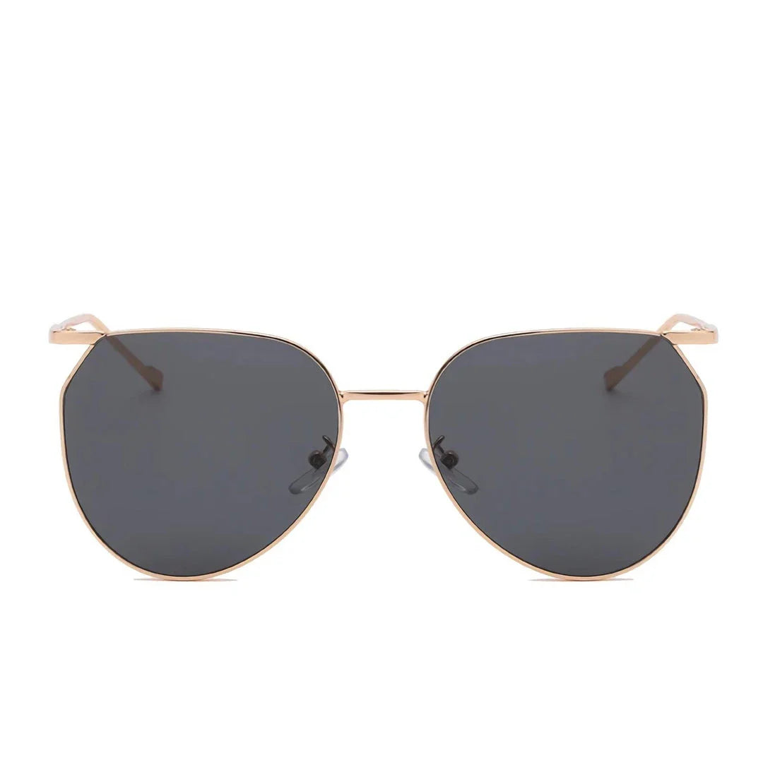 Elegant oval-shaped sunglasses with gradient lenses and alloy frames, offering timeless British style and UV protection.
