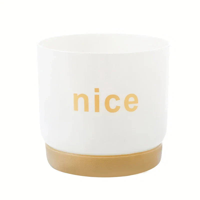 Stylish self-watering planters in various sizes for indoor plants, succulents, and flowers