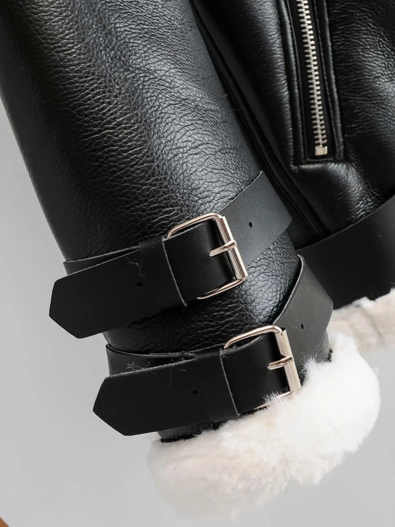 Warm faux leather jacket with plush faux fur lining, available in classic British colours for autumn and winter wear.