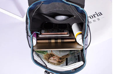 Diamond-patterned backpack in various colours, featuring a sophisticated and contemporary British design