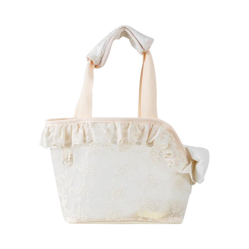 Stylish and comfortable pet carrier bag for small dogs in a floral lace design, providing breathable and cushioned support for your furry friend