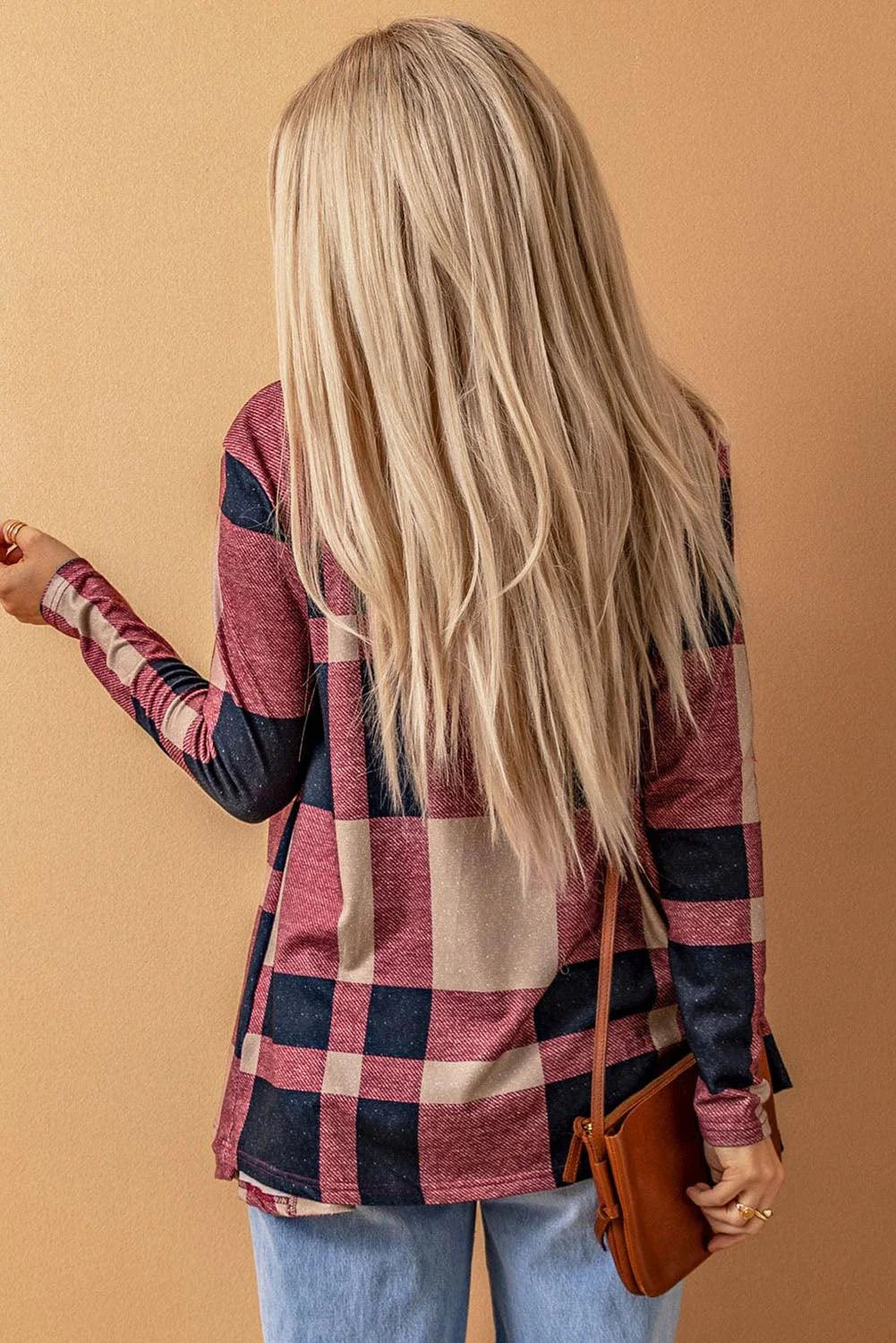 A stylish plaid open-front cardigan in a relaxed, comfortable silhouette for versatile British-inspired fashion