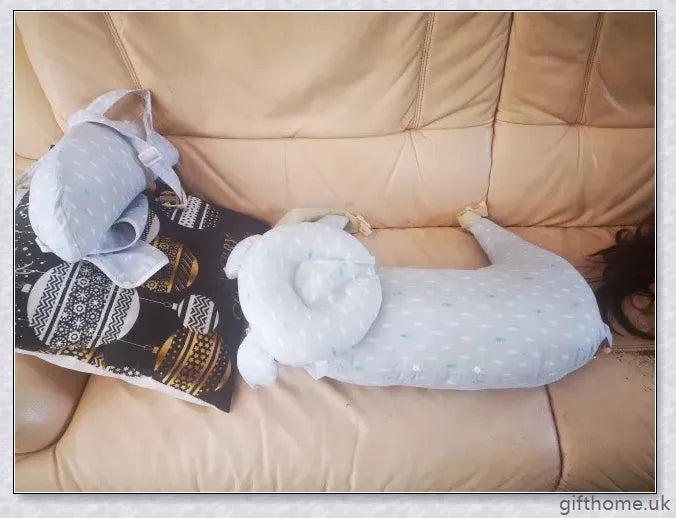 Premium breastfeeding nursing pillow with adjustable buckle, soft cotton fabric, and extra cushioning to support baby's head and prevent reflux.