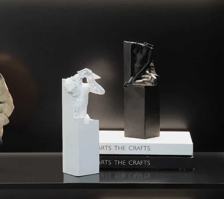 Elegant abstract sculpture in black and white, a minimalist desktop ornament that adds modern art decor to any space